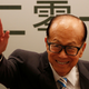 Li attends Hutchison’s earnings press conference in 2017.